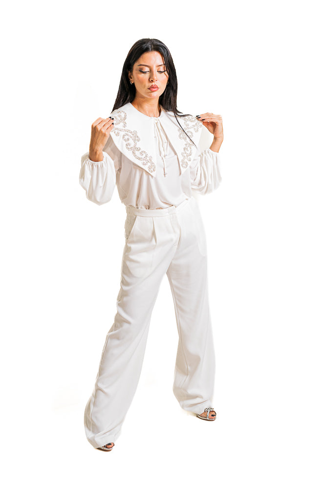 White Two-Piece Set of Crystal Blouse and High-Waisted Pants by The Embroidered Corner