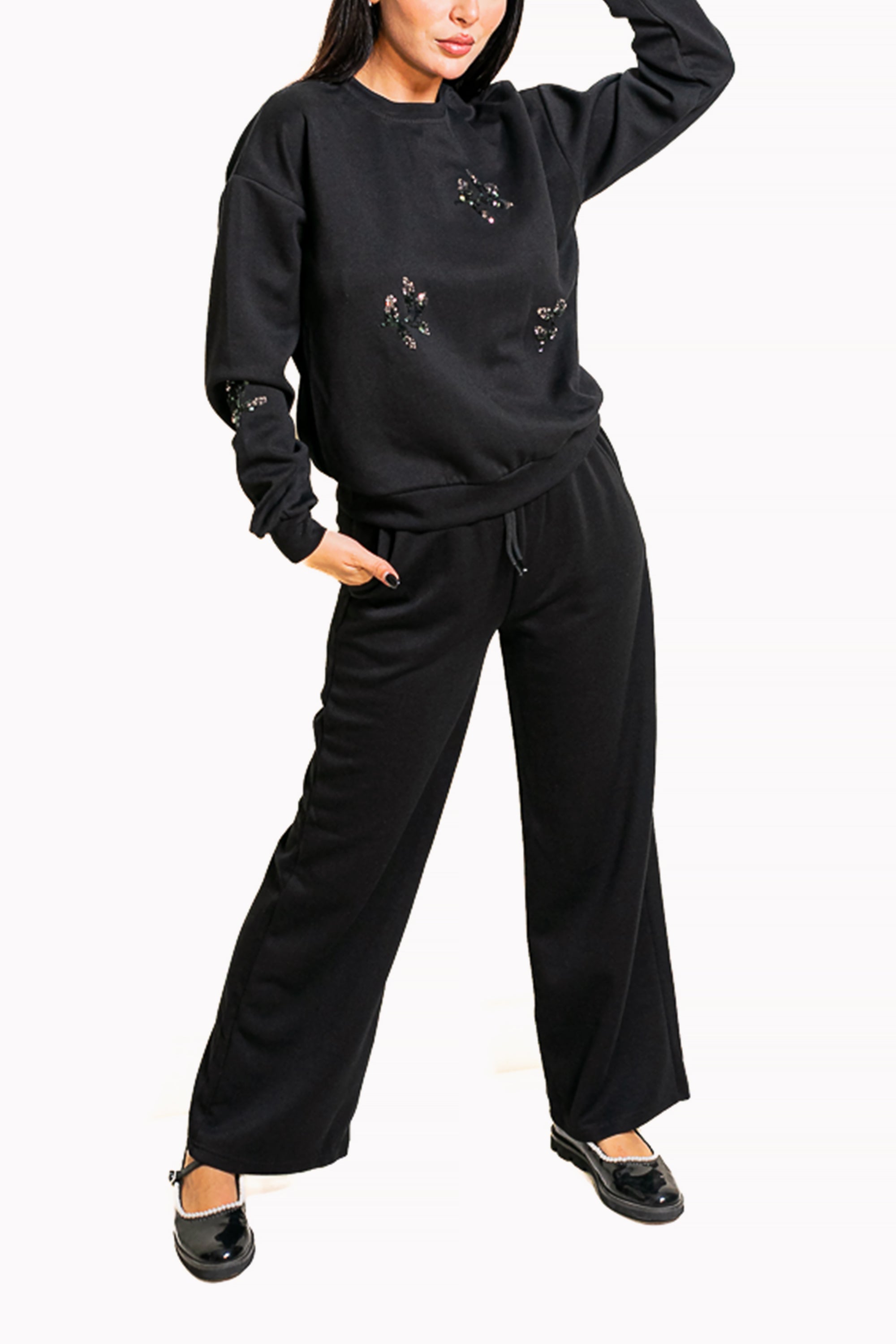 Black Two-Piece Set of Sweatshirt and Wide-Leg Pants by The Embroidered Corner