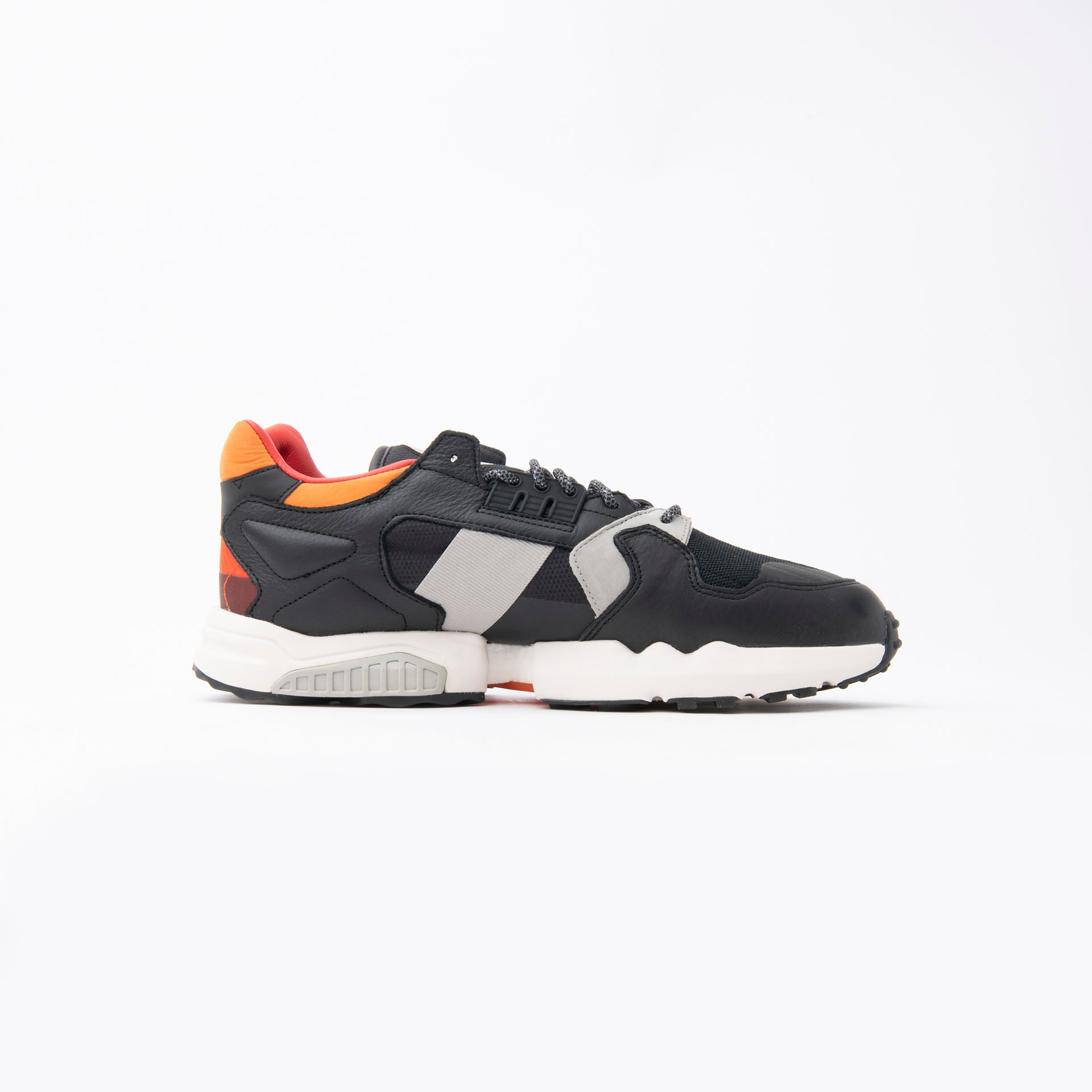 Black And Orange ZX Torsion Sneakers From Adidas