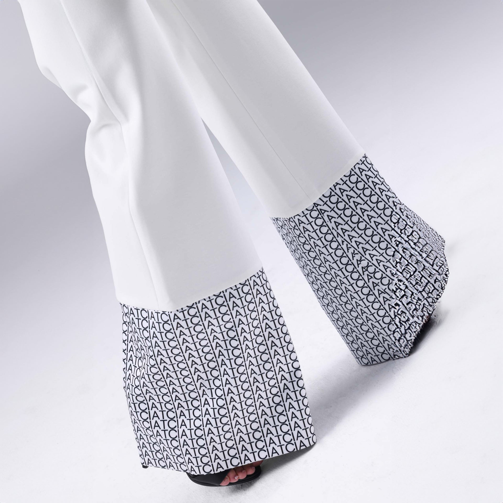 White Signature Hem Trousers By I am the Company