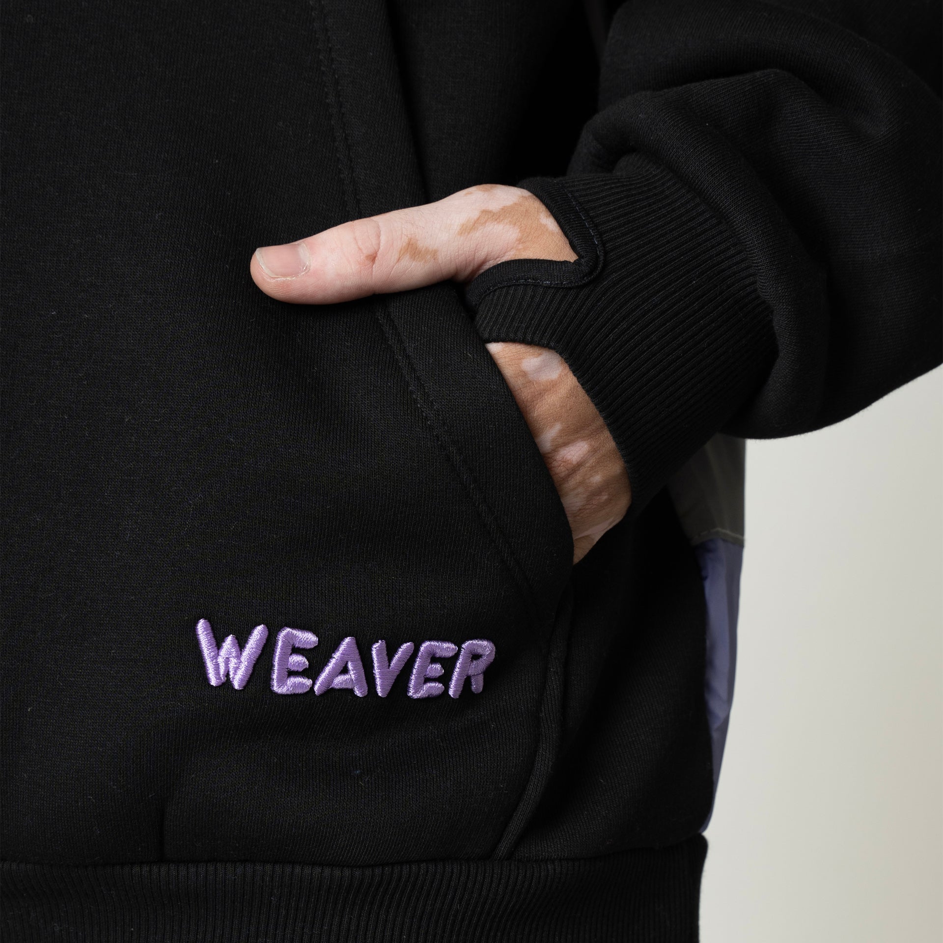 Black Hoodie With Purple Logo From Weaver Design