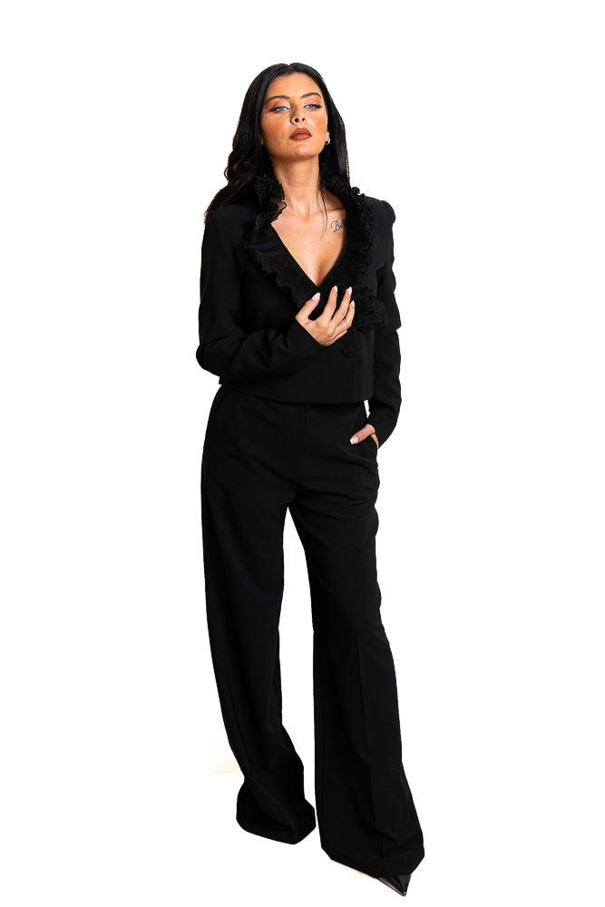 Black Two-Piece Set of Ruffled Jacket and Pants by The Embroidered Corner