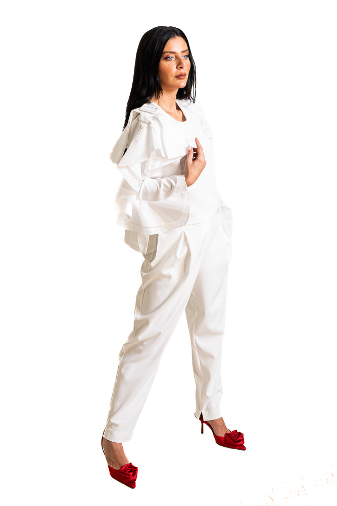 White Two-Piece Set of Ruffled Blouse and High-Waisted Pants by The Embroidered Corner