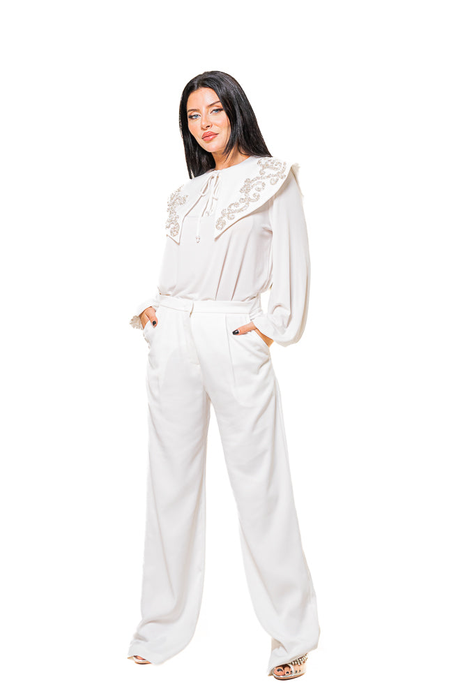 White Two-Piece Set of Crystal Blouse and High-Waisted Pants by The Embroidered Corner