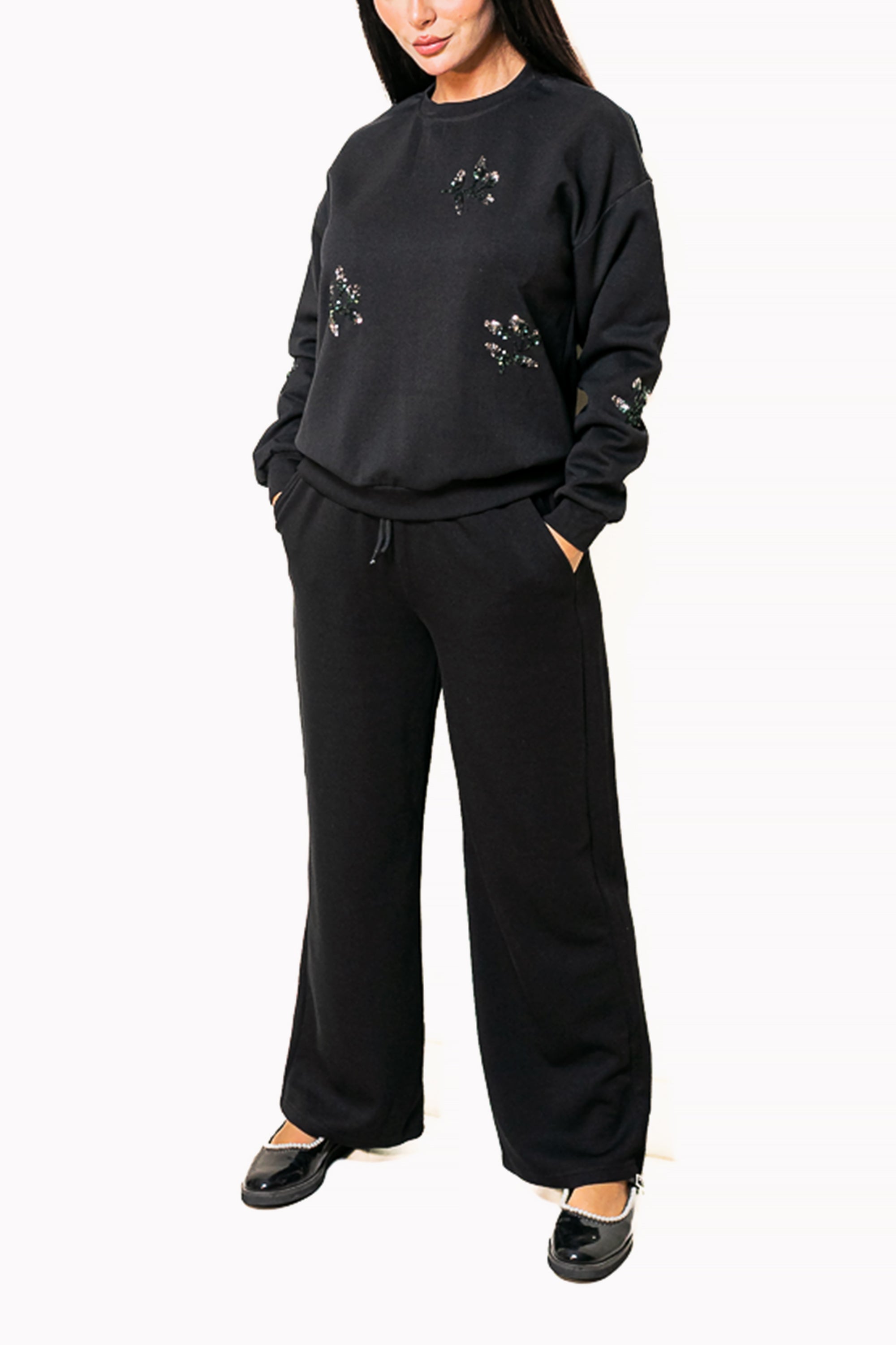 Black Two-Piece Set of Sweatshirt and Wide-Leg Pants by The Embroidered Corner
