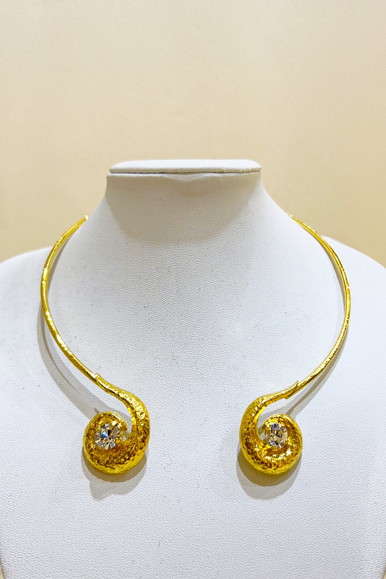 Gold Curved Twirl Necklace by M Collection