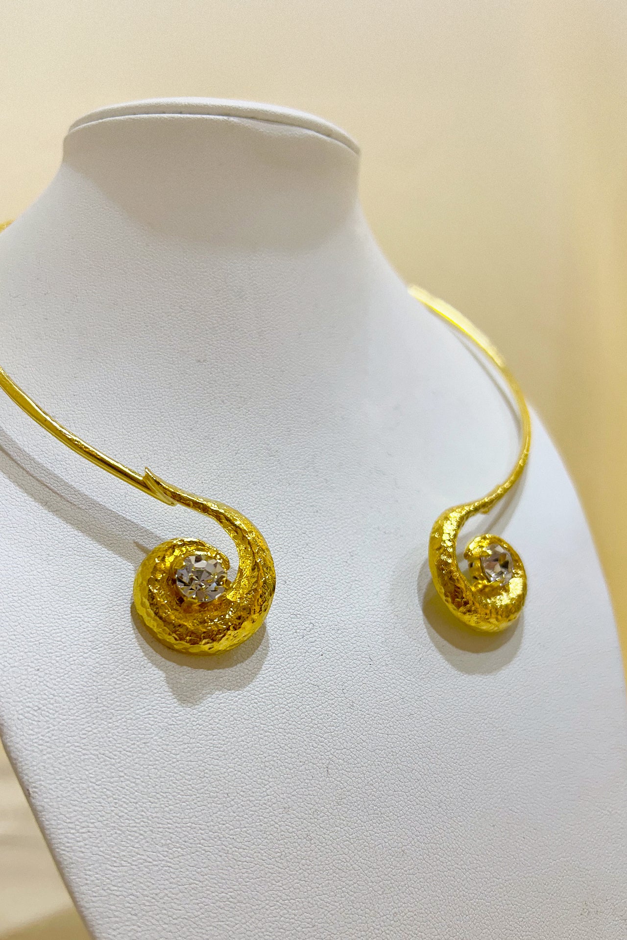 Gold Curved Twirl Necklace by M Collection
