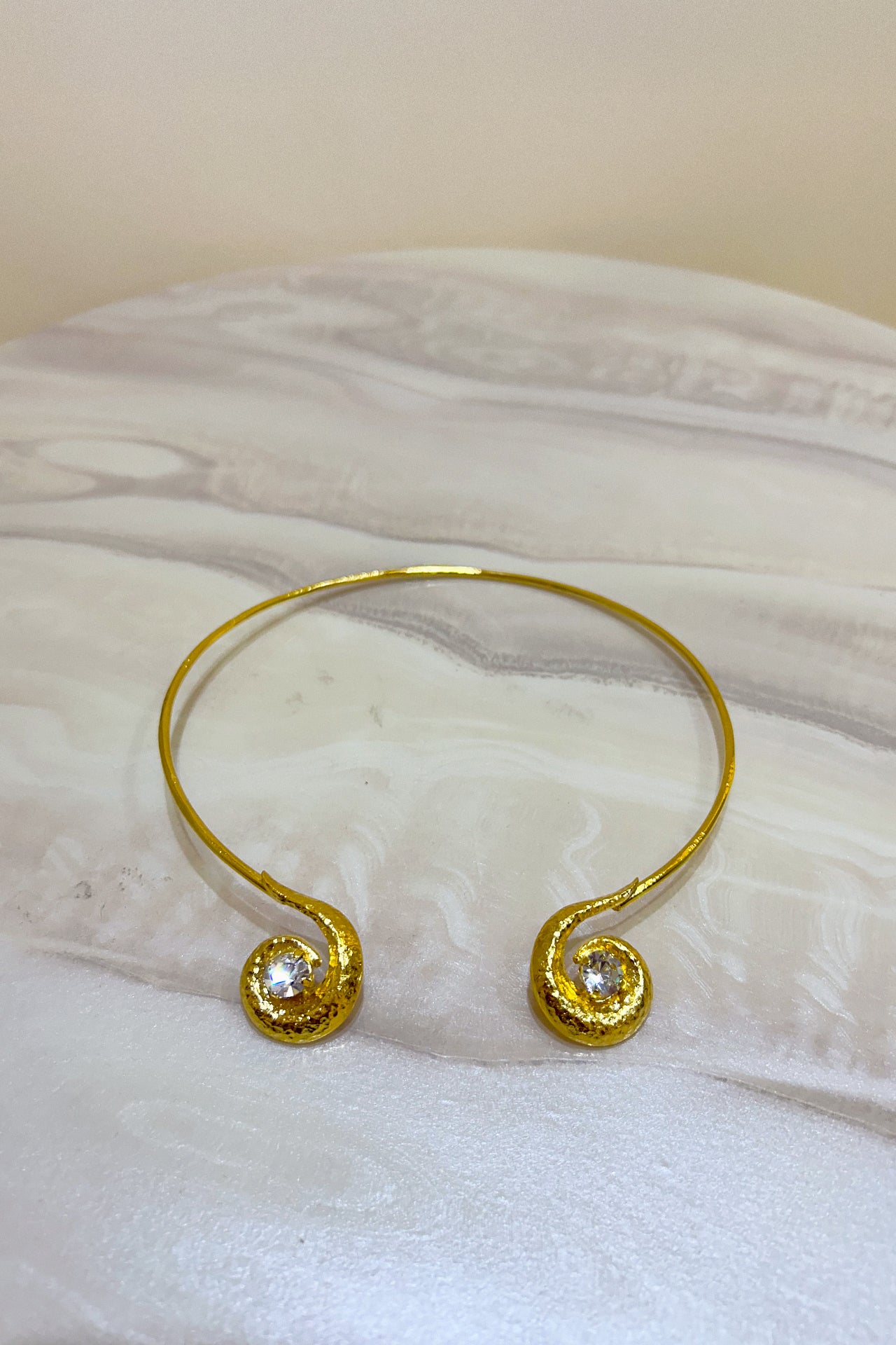 Gold Curved Twirl Necklace by M Collection