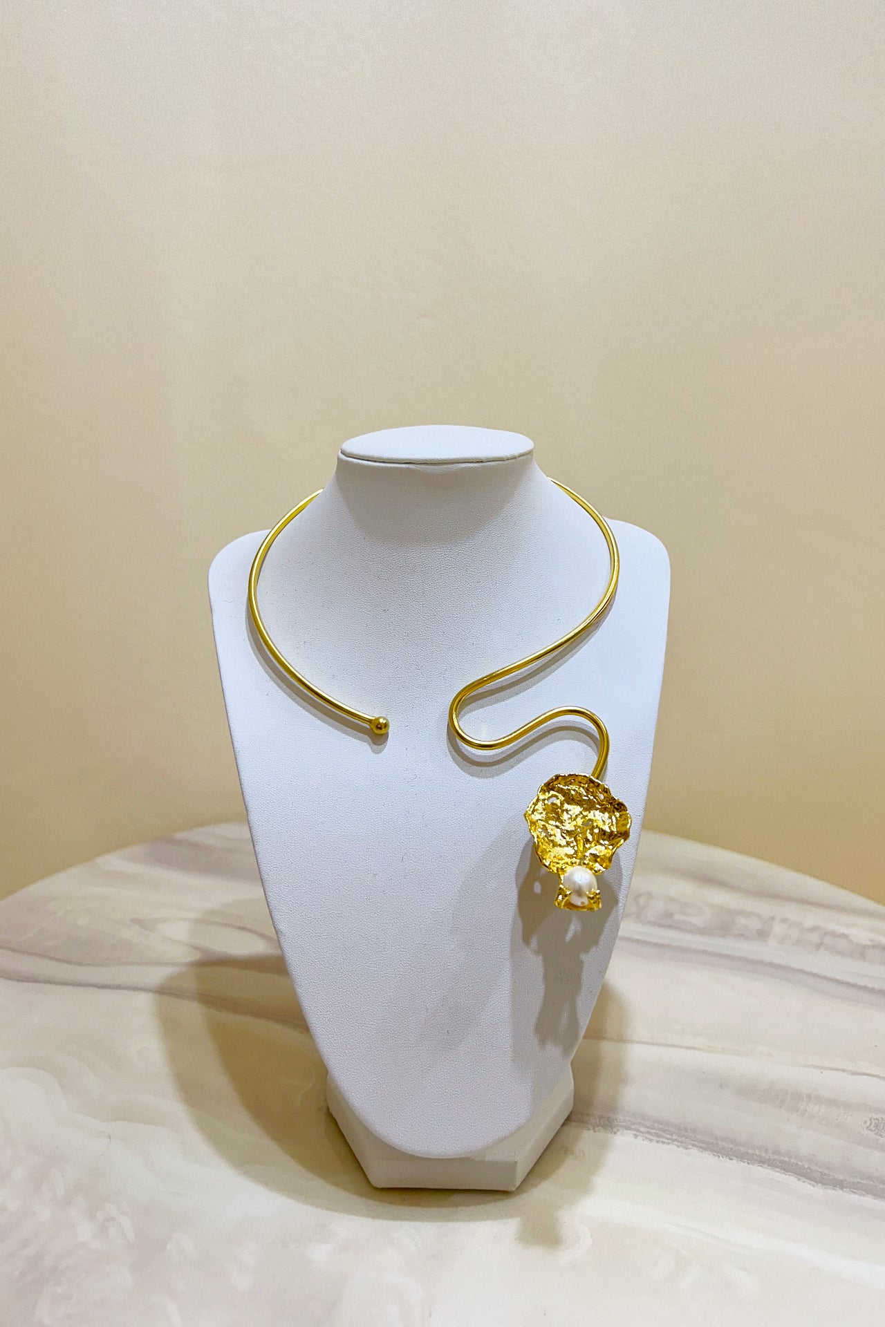 Gold Curved Leaf Necklace by M Collection