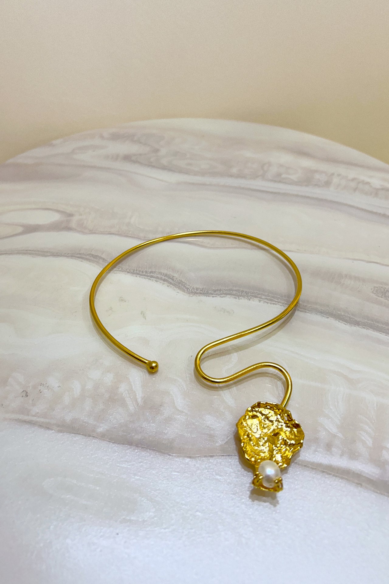 Gold Curved Leaf Necklace by M Collection
