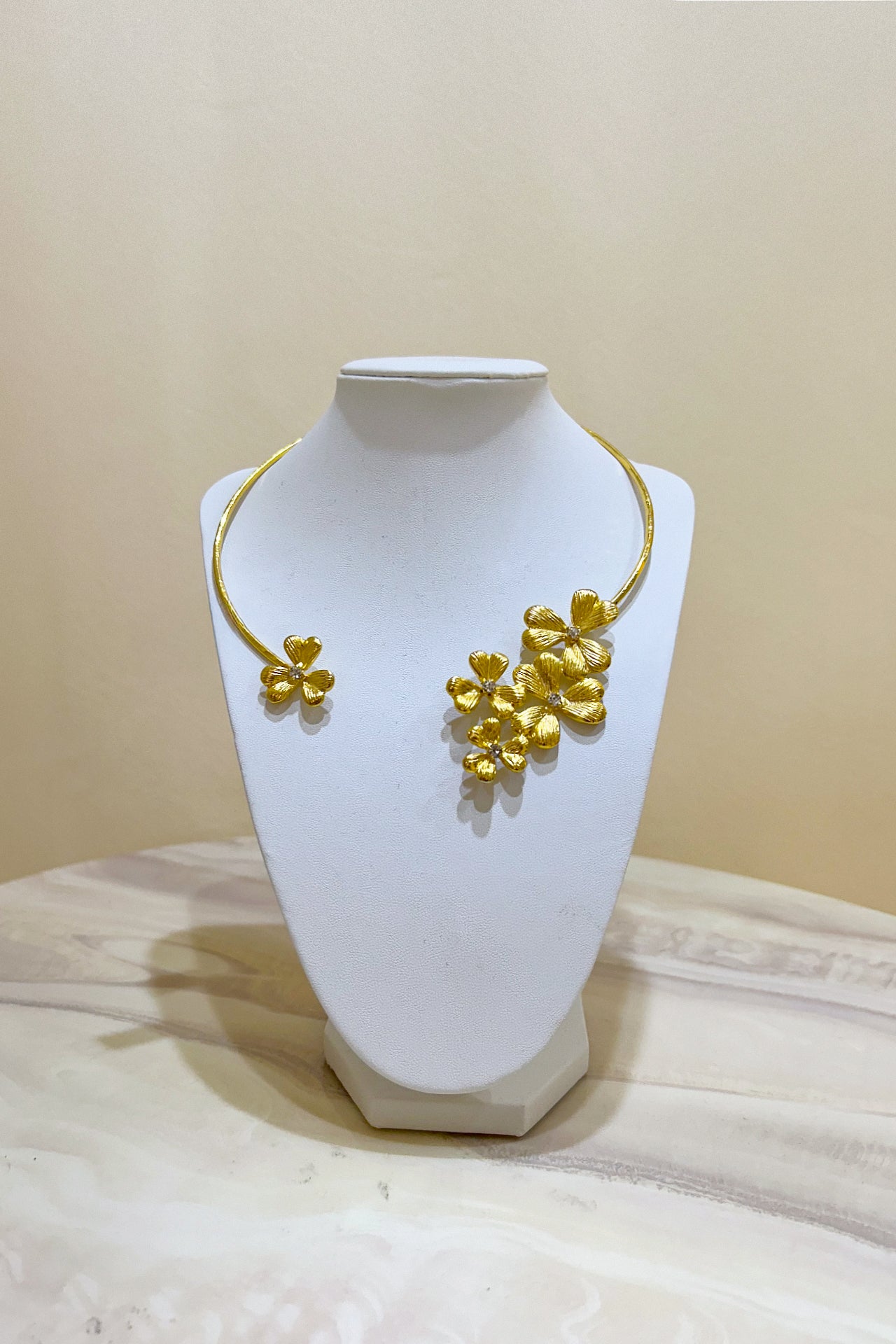 Gold Curved Floral Necklace by M Collection