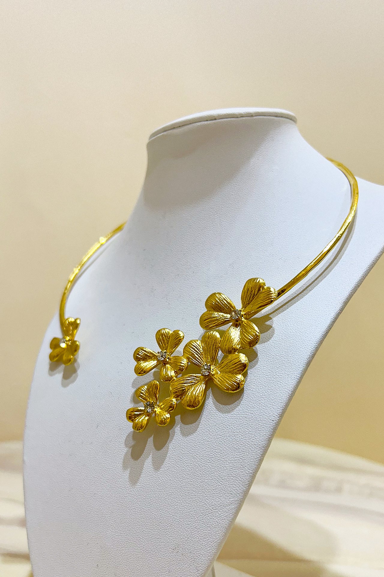 Gold Curved Floral Necklace by M Collection