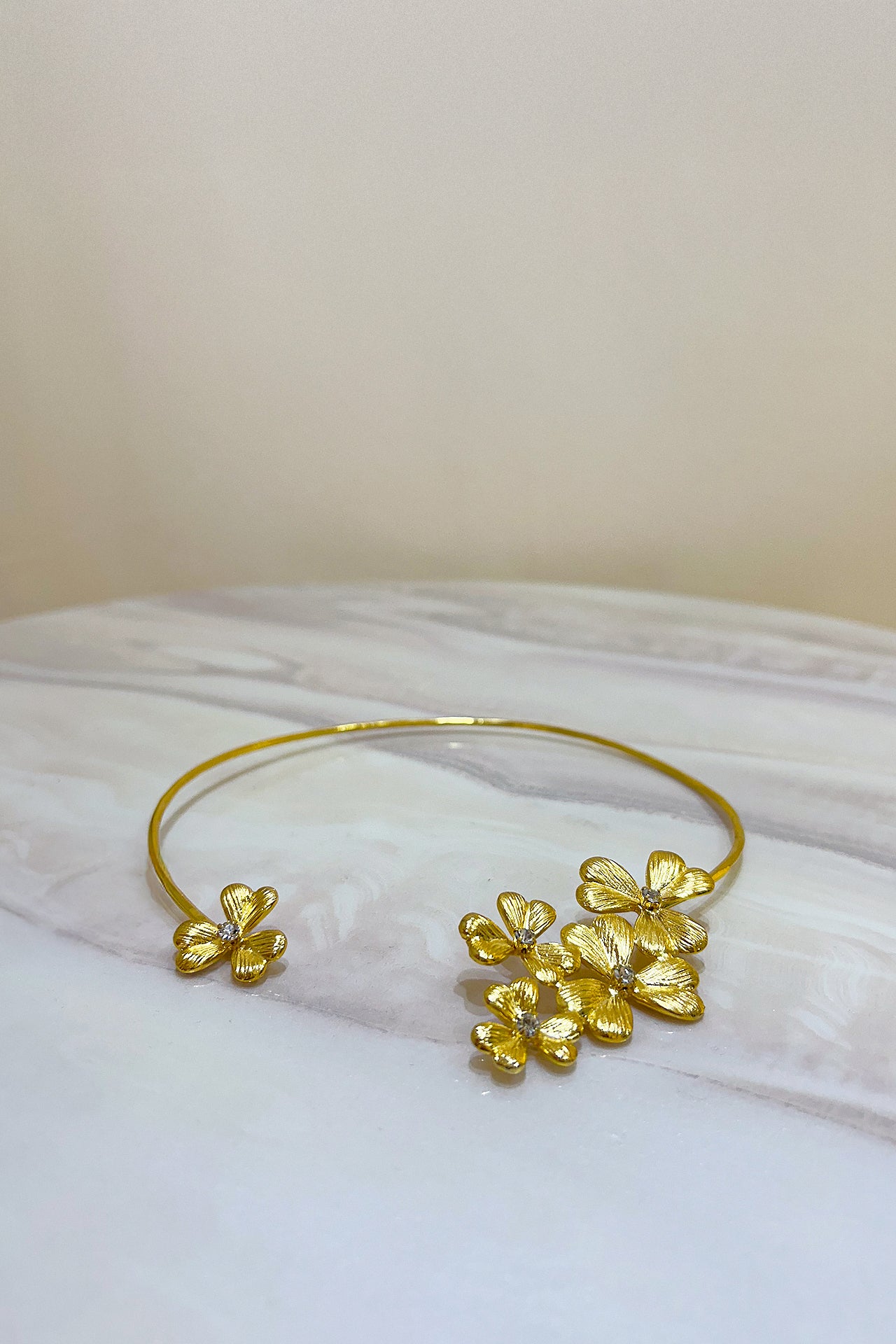 Gold Curved Floral Necklace by M Collection