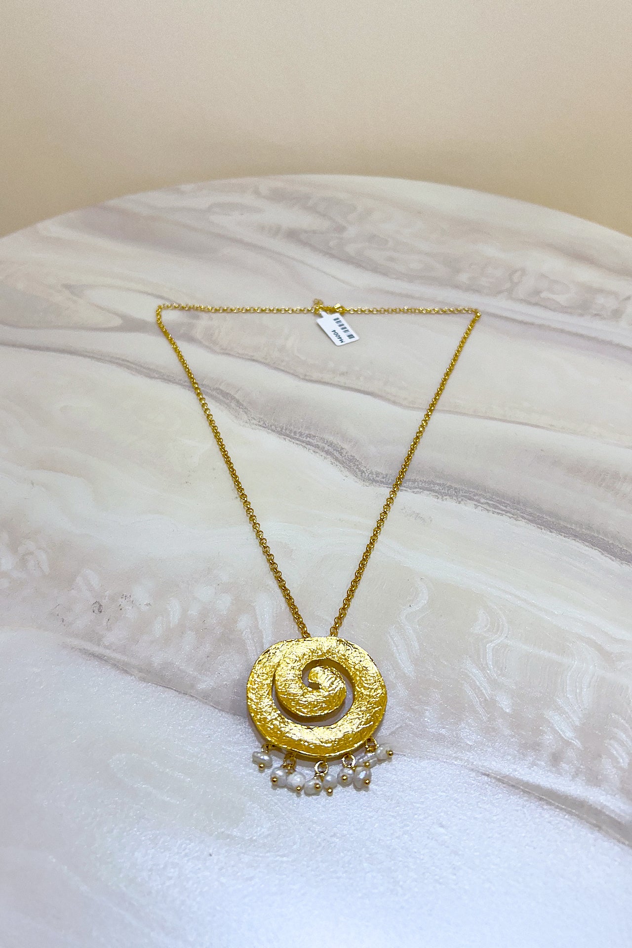 Gold Swirling Pearl Necklace by M Collection