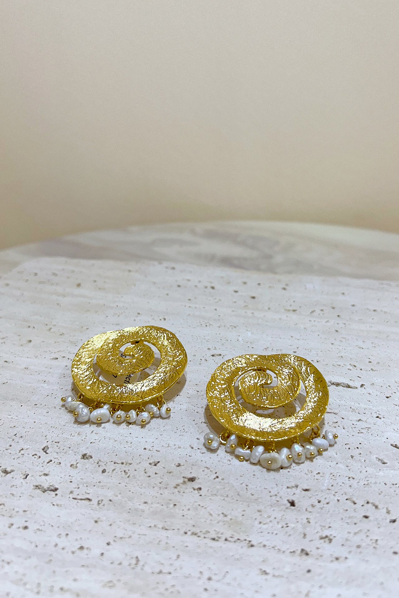 Gold Swirling Pearl Earrings by M Collection