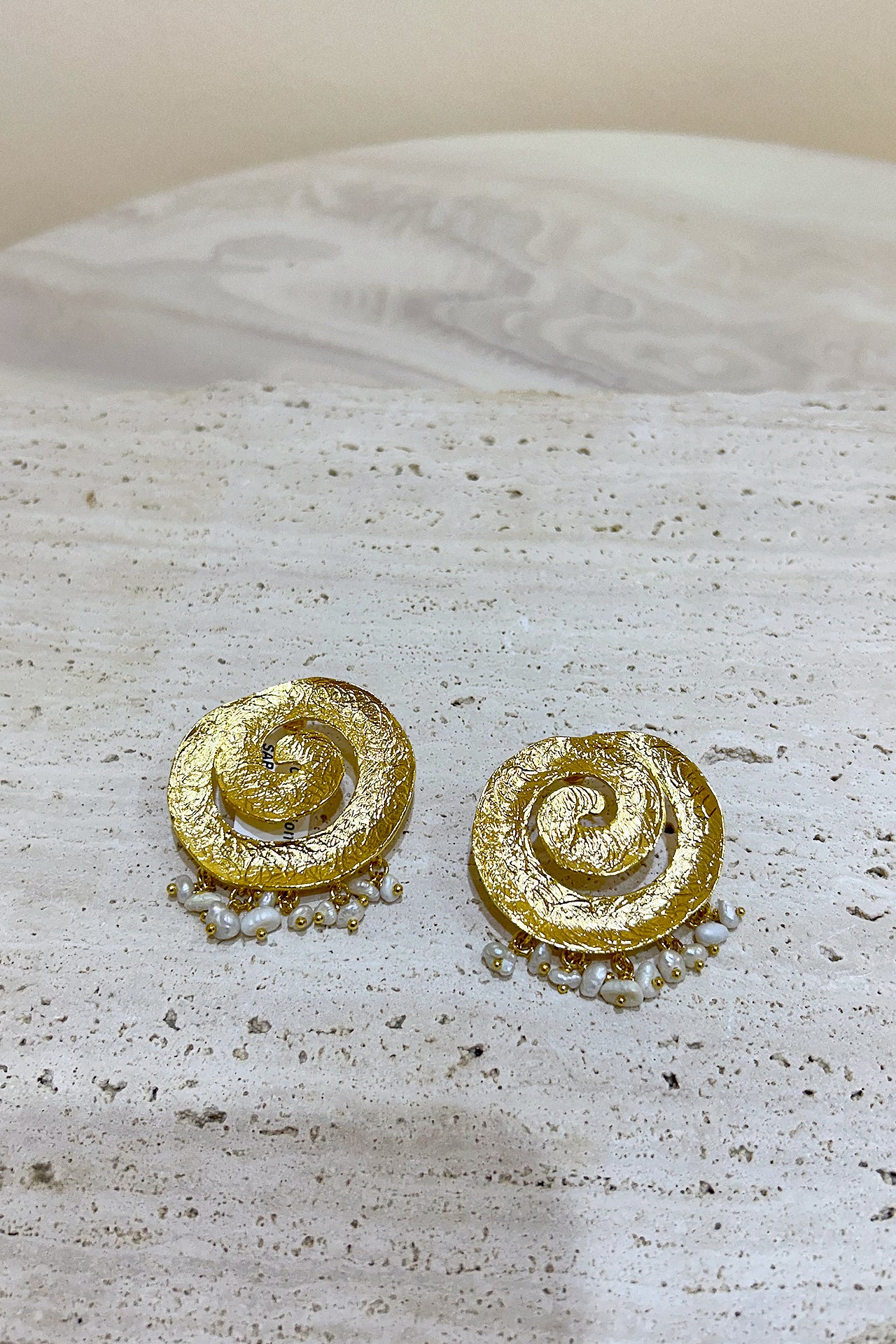 Gold Swirling Pearl Earrings by M Collection