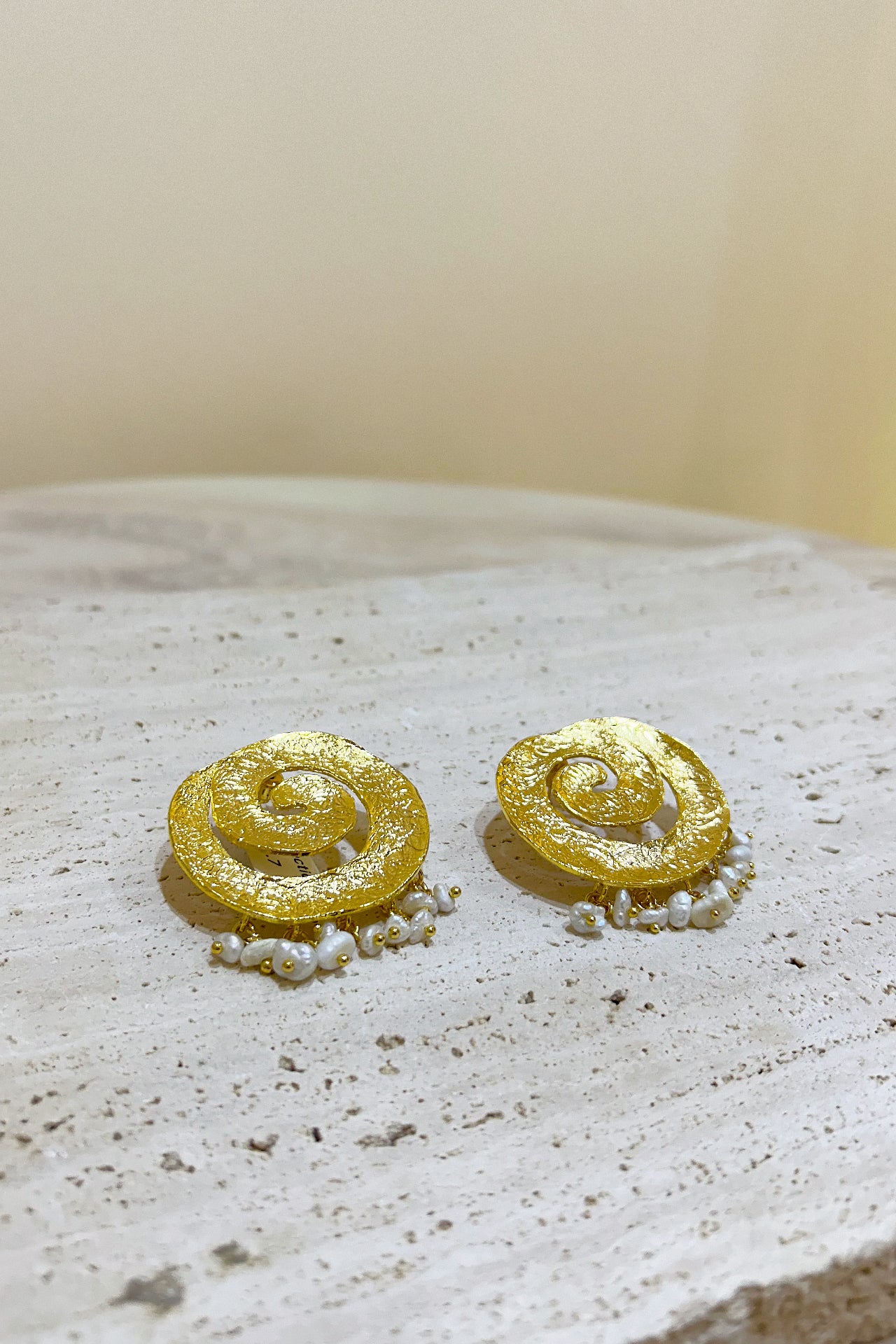 Gold Swirling Pearl Earrings by M Collection