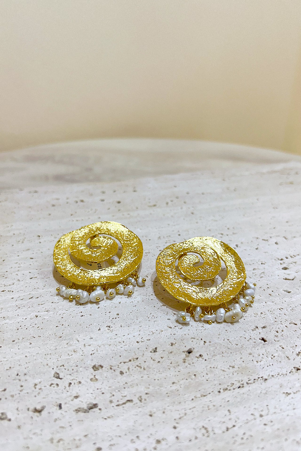 Gold Swirling Pearl Earrings by M Collection
