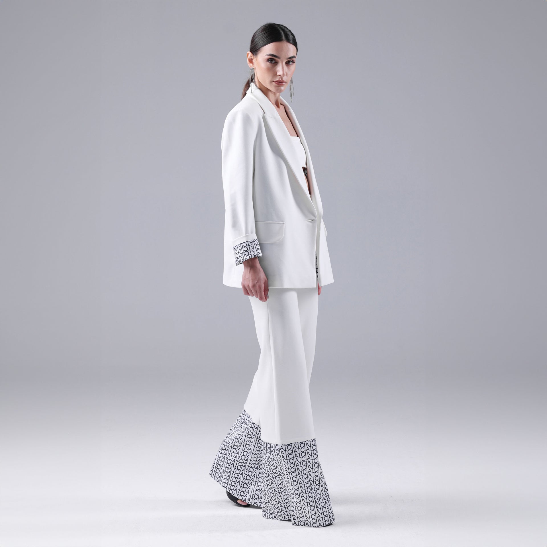 White Signature Hem Trousers By I am the Company