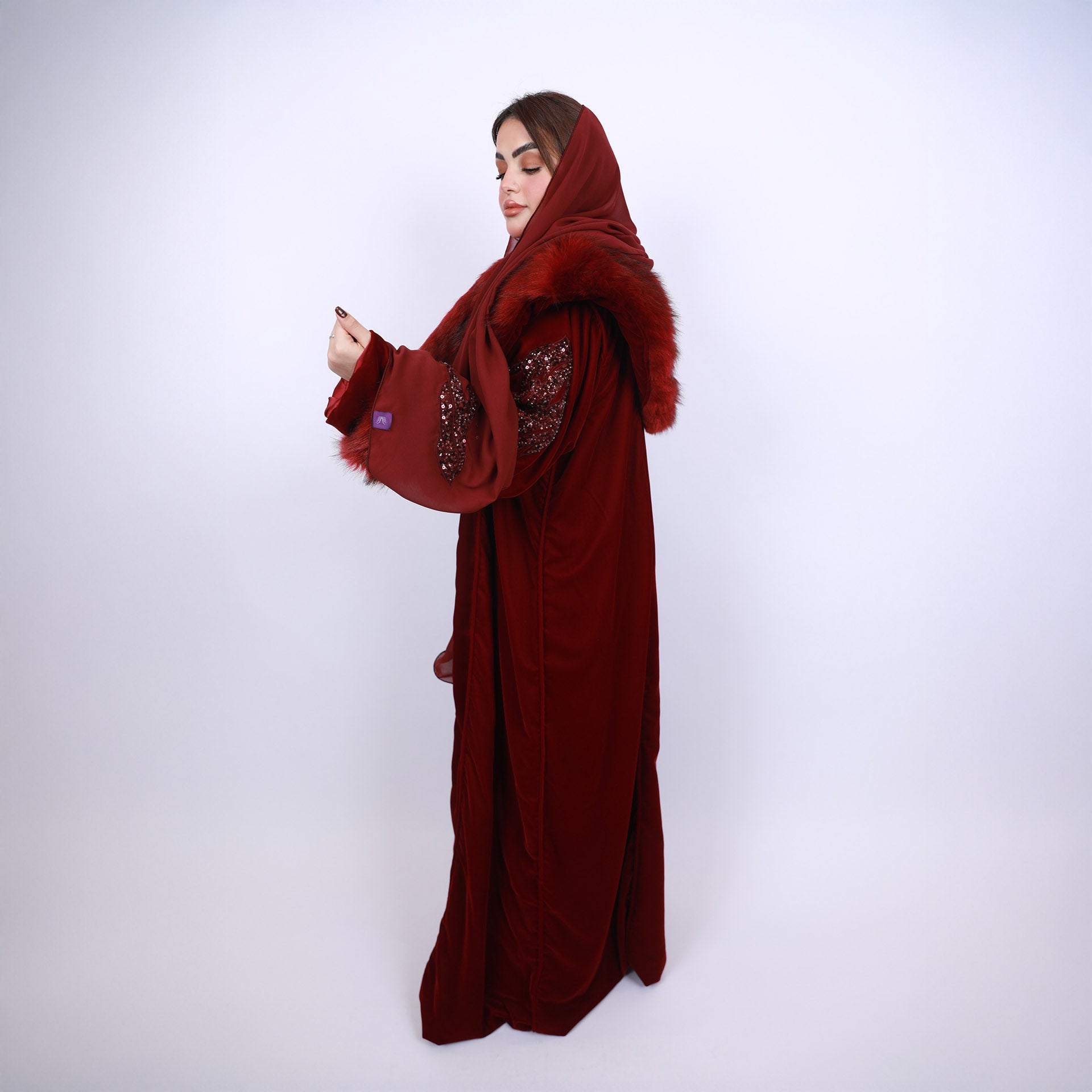 Burgundy Velvet Abaya with Fur by Khloud Al-Saadawi