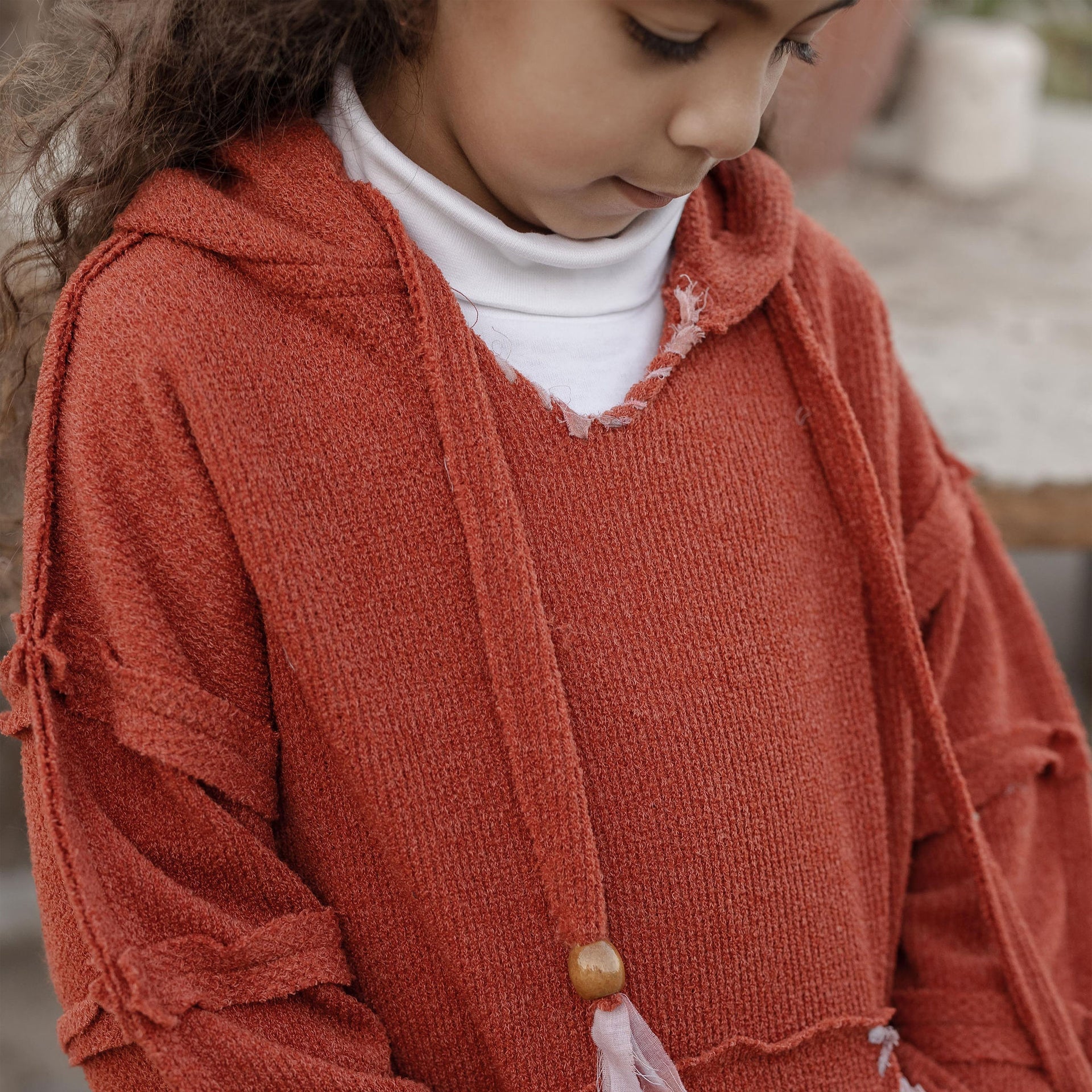 Little Stitched Up Coziness Hoodie in Red Brick by FUFA