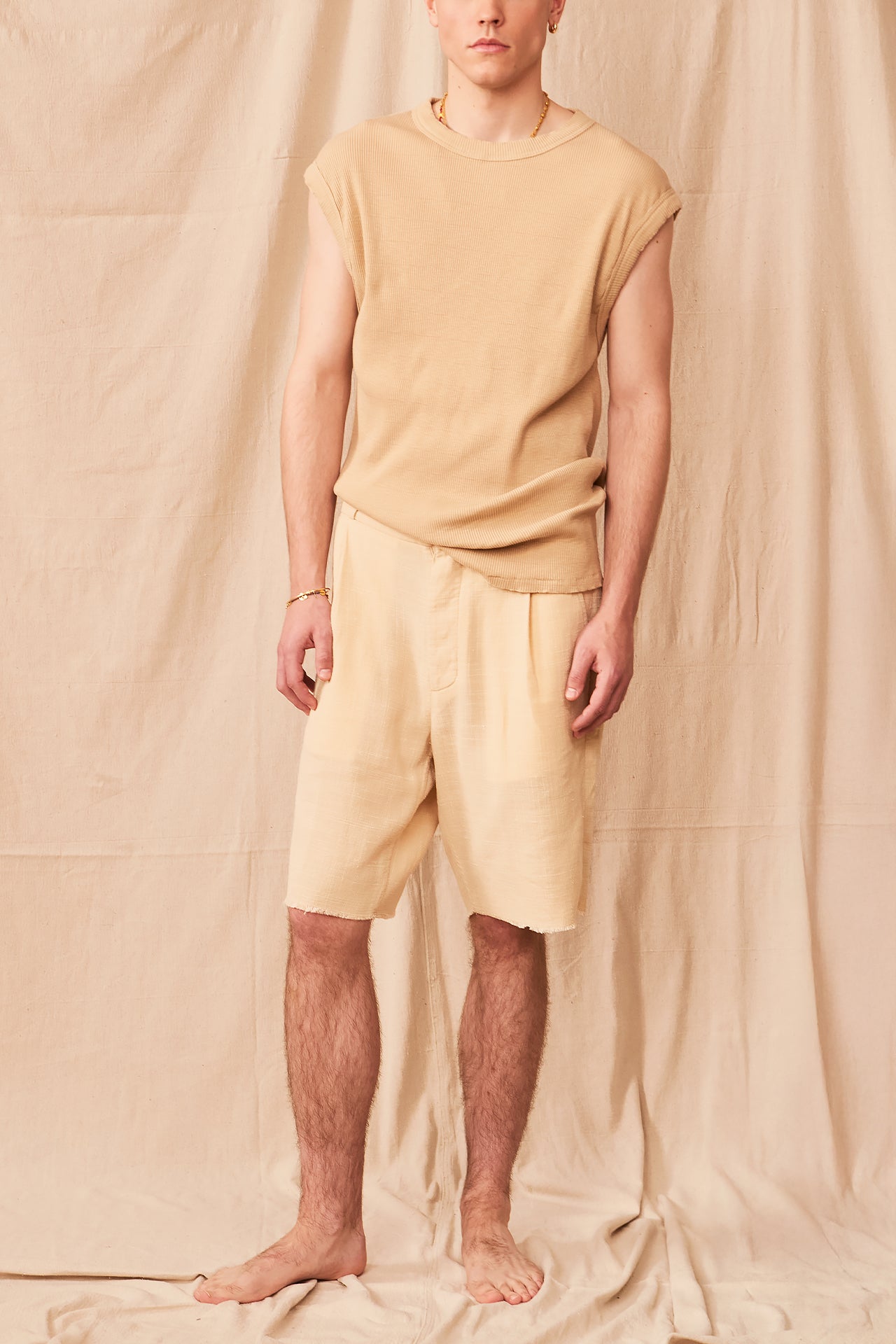 Beige Single Pleat Shorts by AARC55