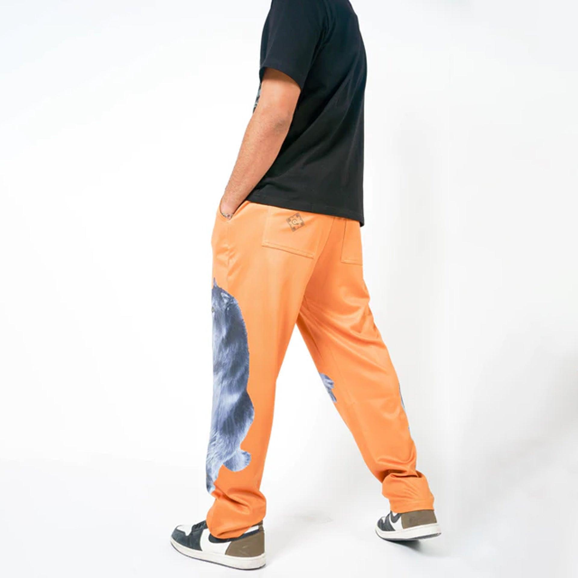 Orange pants with wolf print FROM HOUSE OF CENMAR - WECRE8